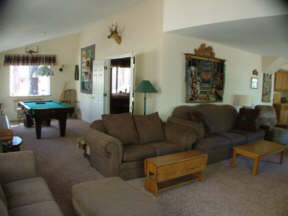 pool table in living room with play area