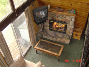 Living Room has Stereo with mp3 input, TV, DVD/VHS player and large collection of DVD/VHS's.
